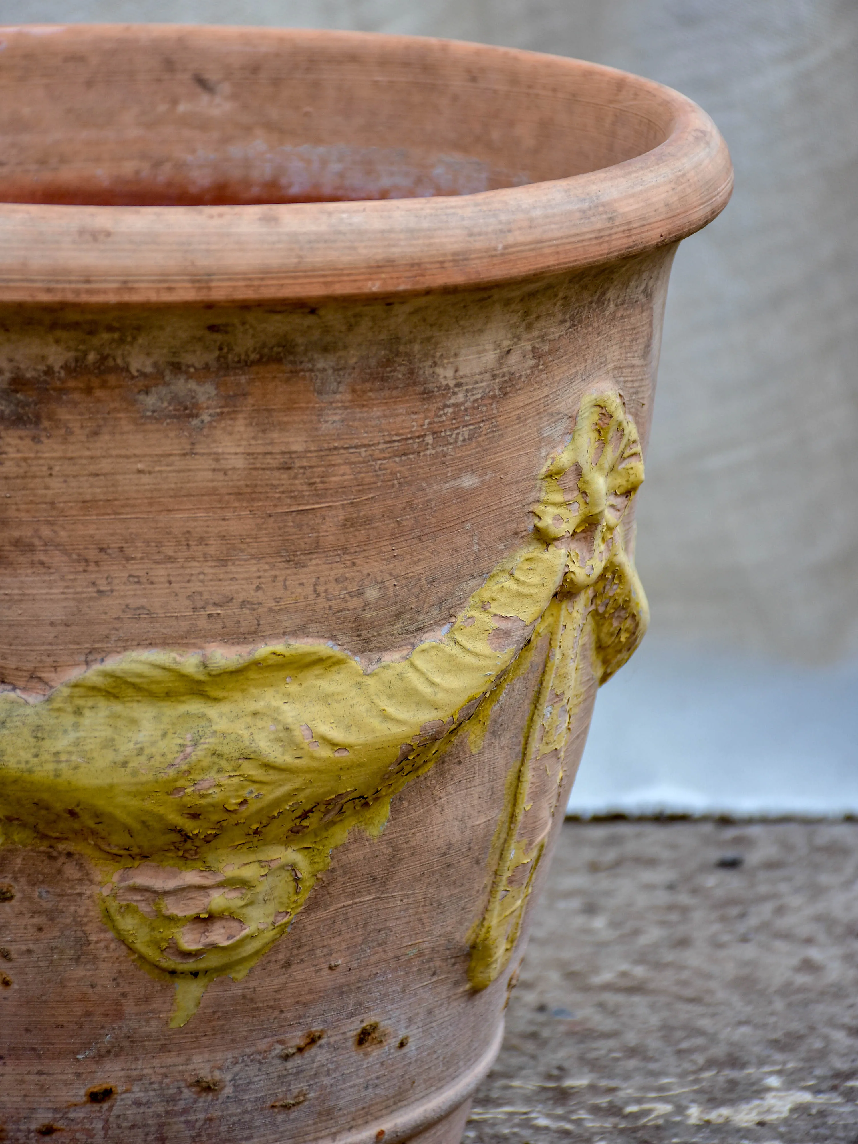 Pair of vintage terracotta garden planters with garlands