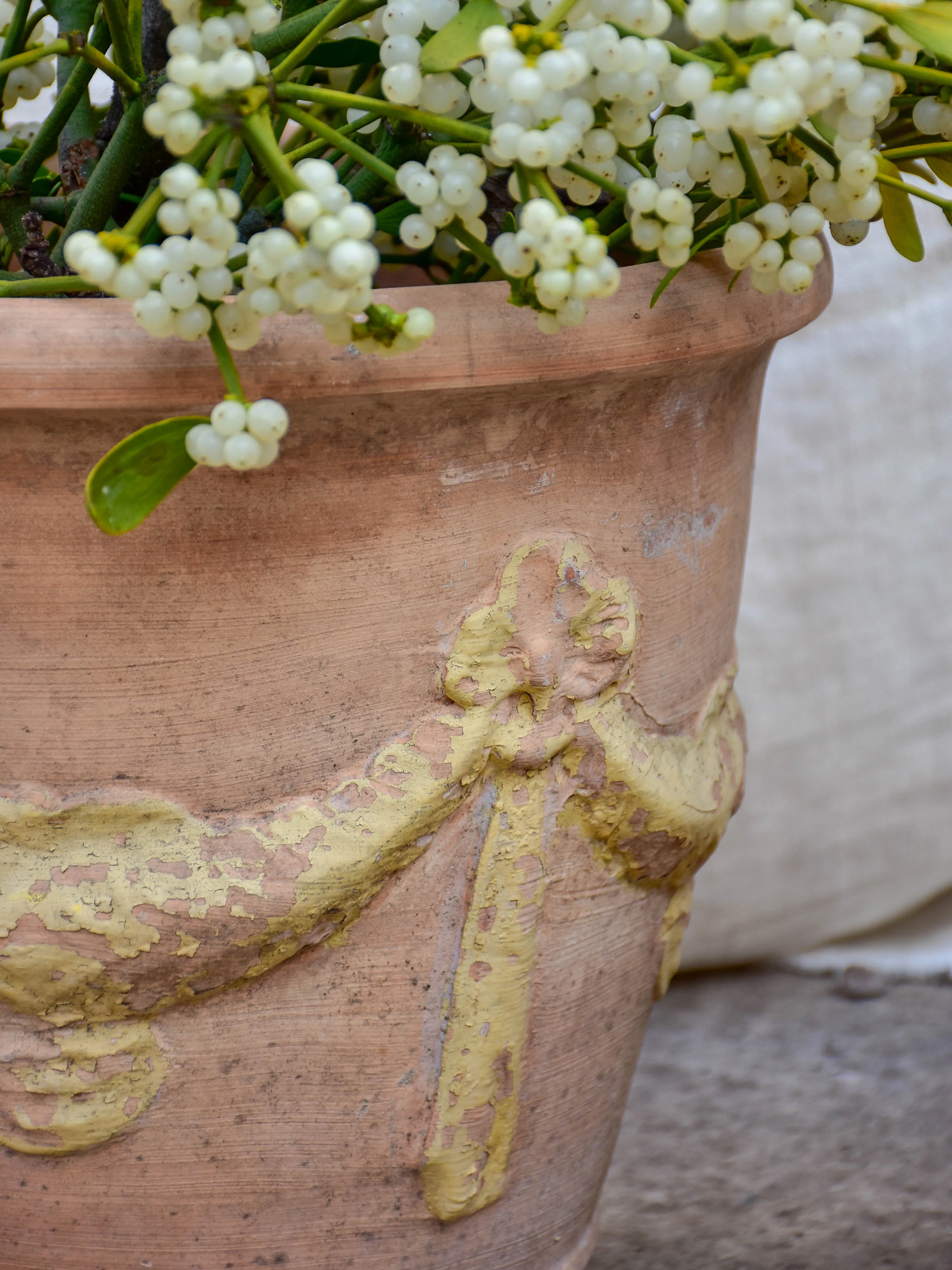 Pair of vintage terracotta garden planters with garlands